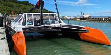 F45 carbon trimaran being delivered by yacht delivery solutions skipper